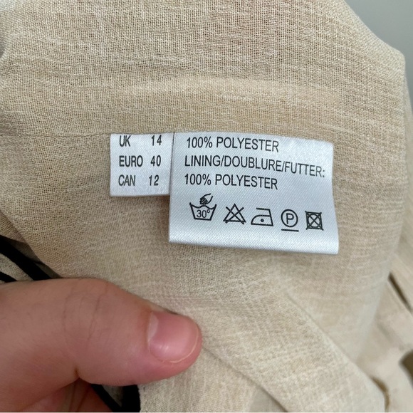 Elegant Beige Tank Top with Black Trim - Picture 7 of 8